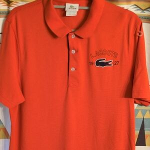 Lacoste Orange Polo Shirt with Navy Crocodile Logo